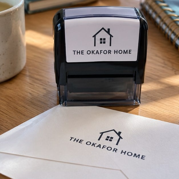 Customer photo of a custom self-inking address stamp